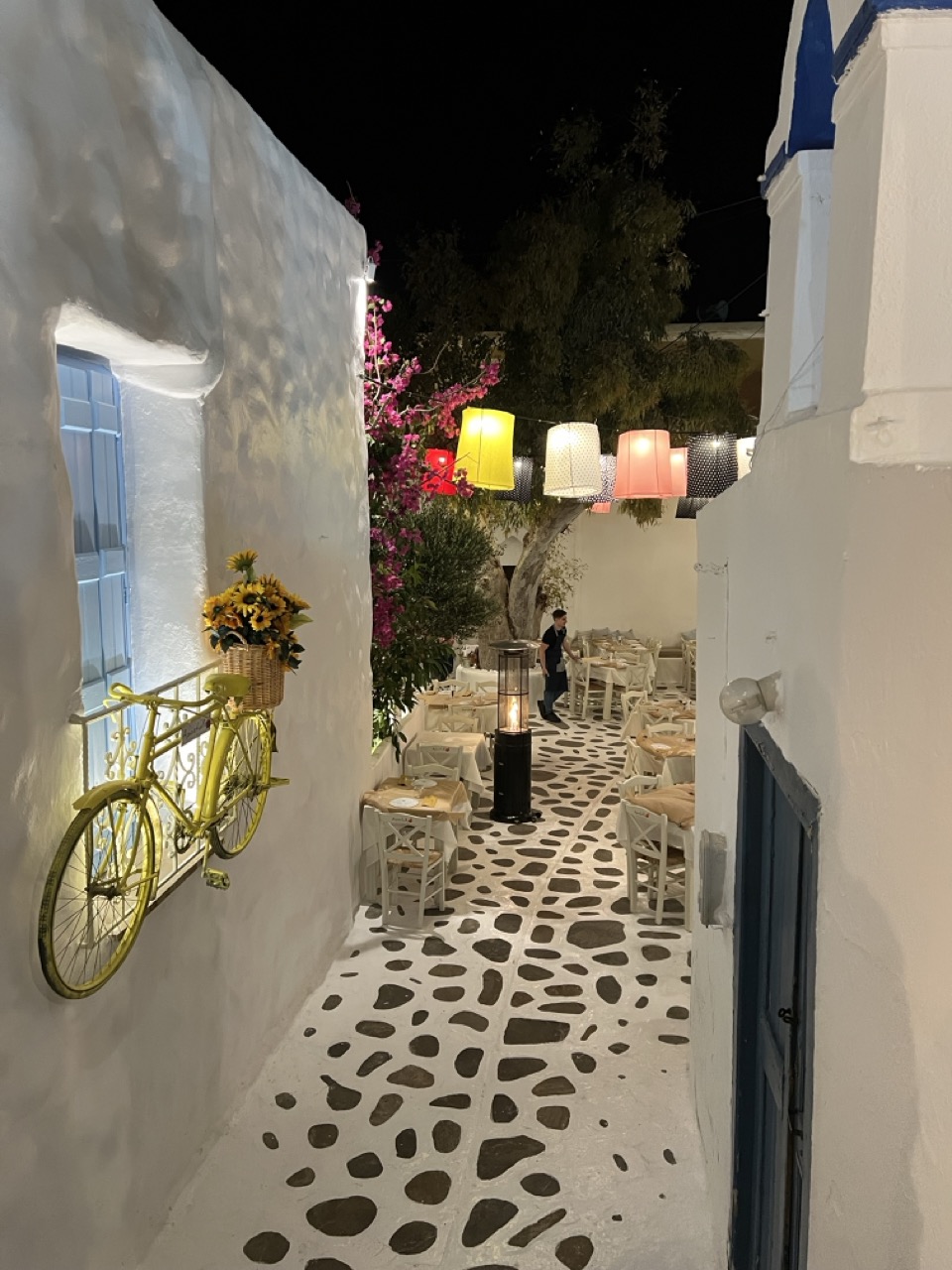 A nice street with an outdoor restaurant in Chora, Naxos, Greece