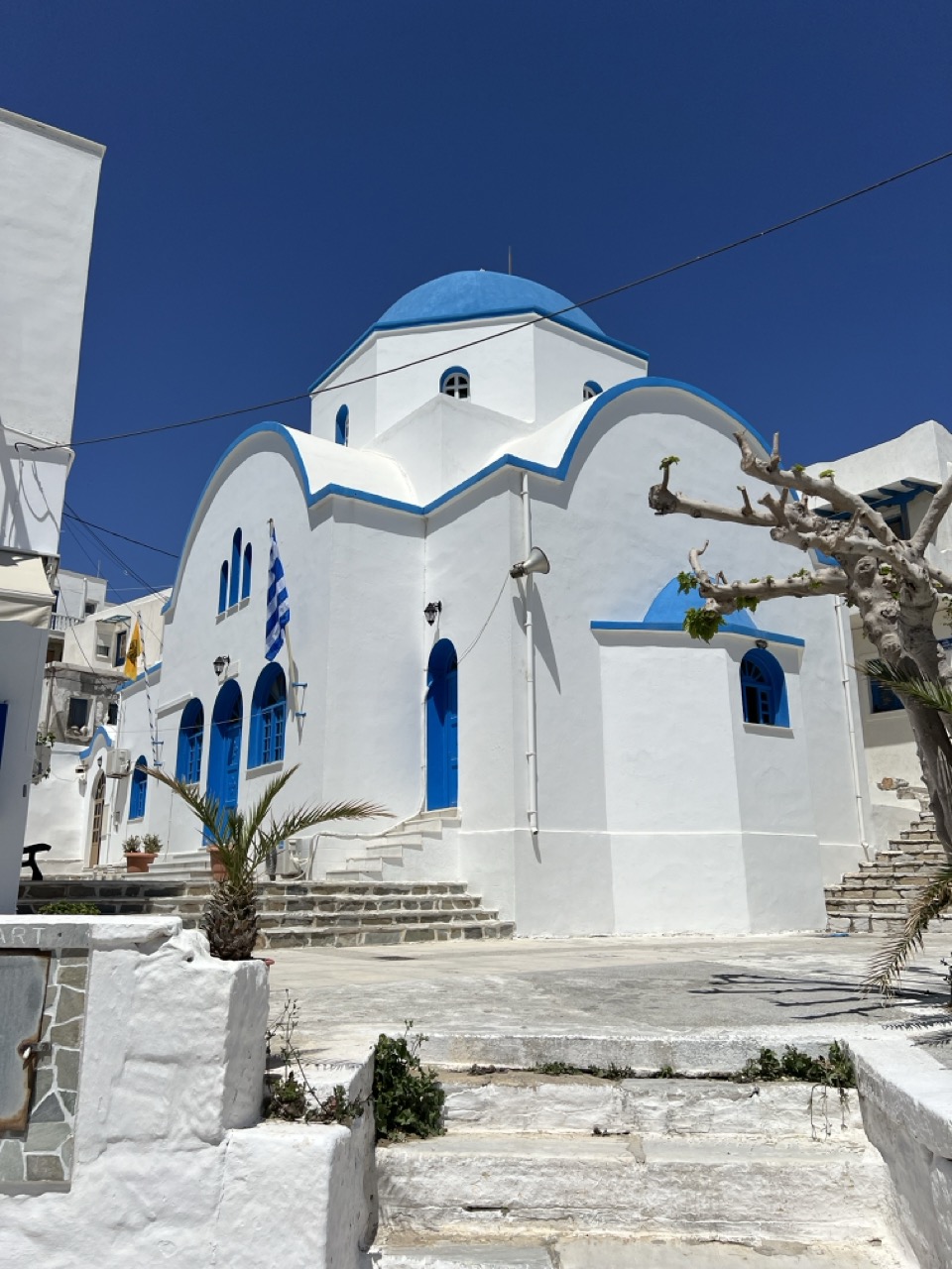 White and blue church in Naxos, Greece